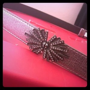 Silver belt with clasp. Adjustable.